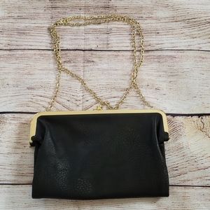 Miztique formal cross body purse.